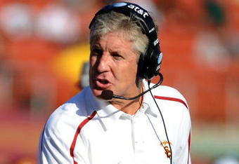 LOS ANGELES, CA - NOVEMBER 14:  Head Coach Pete Carroll of the USC Trojans questions a non-fumble call in the game against the Stanford Cardinal during the second half at the Los Angeles Memorial Coliseum on November 14, 2009 in Los Angeles, California.  Stanford won 55-21.  (Photo by Harry How/Getty Images)