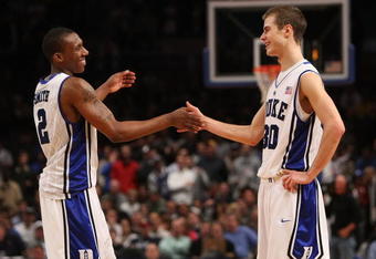 NEW YORK - NOVEMBER 27: Nolan Smith #2 of the Duke Blue Devils celebrates the win with teammate Jon Scheyer #30 against the Connecticut Huskies during the Championship game at Madison Square Garden on November 27, 2009 in New York, New York.  (Photo by Nick Laham/Getty Images)