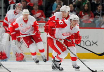 DENVER - OCTOBER 24:  Darren Helm #43 of the Detroit Red Wings as Pavel Datsyuk #13, Nicklas Lidstrom #5 and goalie Jimmy Howard #35 follow the play against the Colorado Avalanche during NHL action at the Pepsi Center on October 24, 2009 in Denver, Colorado. The Avalanche defeated the Red Wings 3-1.  (Photo by Doug Pensinger/Getty Images)