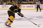 BOSTON - OCTOBER 10:  Marc Savard #92 of the Boston Bruins takes a penalty shot in overtime the New York Islanders on October 10, 2009 at the TD Garden in Boston, Massachusetts. The Bruins defeated the Islanders 4-3 in an overtime shootout.  (Photo by Elsa/Getty Images)