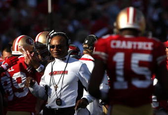 SAN FRANCISCO - NOVEMBER 08:  Head coach Mike Singletary of the San Francisco 49ers looks on with Michael Crabtree #15 against the Tennessee Titans during an NFL game on November 8, 2009 at Candlestick Park in San Francisco, California.  (Photo by Jed Jacobsohn/Getty Images)