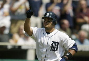 DETROIT - AUGUST 8:  Ivan Rodriguez #7 of the Detroit Tigers points to the sky as he runs to the plate after hitting a solo home run against the Boston Red Sox in the first inning of the game on August 8, 2004 at Comerica Park in Detroit, Michigan.  The Red Sox defeated the Tigers 11-9.  (Photo by Tom Pidgeon/Getty Images)