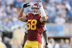 PASADENA, CA - DECEMBER 6:  Rey Maualuga #58 of the USC Trojans gestures against the UCLA Bruins on December 6, 2008 at the Rose Bowl in Pasadena, California.  USC won 28-7.  (Photo by Jeff Golden/Getty Images)