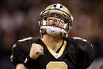 NEW ORLEANS - NOVEMBER 30: Quarterback Drew Brees #9 of the New Orleans Saints celebrates after a touchdown against the New England Patriots at Louisana Superdome on November 30, 2009 in New Orleans, Louisiana.  (Photo by Chris Graythen/Getty Images)