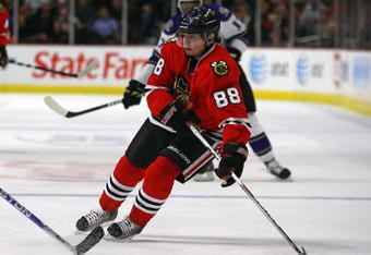 CHICAGO - NOVEMBER 09: Patrick Kane #88 of the Chicago Blackhawks brings the puck up the ice against the Los Angeles Kings at the United Center on November 9, 2009 in Chicago, Illinois. The Blackhawks defeated the Kings 4-1. (Photo by Jonathan Daniel/Getty Images)