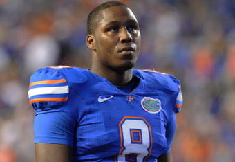GAINESVILLE, FL - NOVEMBER 7: Defensive end Carlos Dunlap #8  of the Florida Gators sets on defense against the Vanderbilt Commodores  on November 7, 2009 at Ben Hill Griffin Stadium in Gainesville, Florida.  (Photo by Al Messerschmidt/Getty Images) 