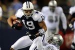 ARLINGTON, TX - NOVEMBER 26:  Wide receiver Miles Austin #19 of the Dallas Cowboys is tackled by Chris Johnson #37 of the Oakland Raiders at Cowboys Stadium on November 26, 2009 in Arlington, Texas.  (Photo by Ronald Martinez/Getty Images)