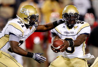 ATLANTA - NOVEMBER 28:  Jonathan Dwyer #21 and quarterback Josh Nesbitt #9 of the Georgia Tech Yellow Jackets against the Georgia Bulldogs at Bobby Dodd Stadium on November 28, 2009 in Atlanta, Georgia.  (Photo by Kevin C. Cox/Getty Images)