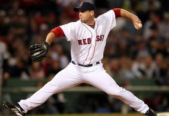 BOSTON - SEPTEMBER 29:  Billy Wagner #13 of the Boston Red Sox delivers a pitch in the eighth inning against the Toronto Blue Jays on September 29, 2009 at Fenway Park in Boston, Massachusetts.  (Photo by Elsa/Getty Images)