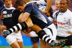 EDINBURGH, SCOTLAND - NOVEMBER 14:  Alex Grove of Scotland tackles Josh Matavesi of Fiji during the Bank of Scotland Corporate Autumn Tests at Murrayfield Stadium on November 14, 2009 in Edinburgh, Scotland.  (Photo by Jeff J Mitchell/Getty Images)