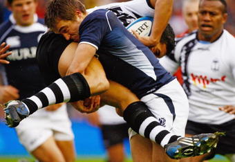 EDINBURGH, SCOTLAND - NOVEMBER 14:  Alex Grove of Scotland tackles Josh Matavesi of Fiji during the Bank of Scotland Corporate Autumn Tests at Murrayfield Stadium on November 14, 2009 in Edinburgh, Scotland.  (Photo by Jeff J Mitchell/Getty Images)