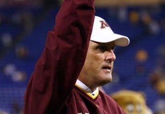 MINNEAPOLIS - SEPTEMBER 13:  Minnesota Golden Gophers' head coach Tim Brewster pumps his fist following his teams victory over the Montana State Bobcats at the Metrodome on September 13, 2008 in Minneapolis, Minnesota. Minnesota defeated Montana State 35-23.  (Photo by Jeff Gross/Getty Images)