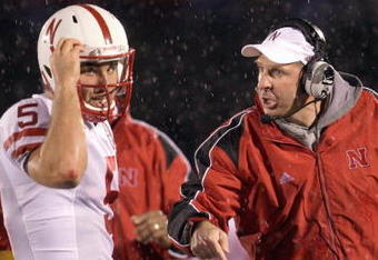 COLUMBIA, MO - OCTOBER 08:  Quarterback Zac Lee #5 of the Nebraska Cornhuskers listens to head coach Bo Pelini during the game against the Missouri Tigers on October 8, 2009 at Faurot Field/Memorial Stadium in Columbia, Missouri. (Photo by Jamie Squire/Getty Images)