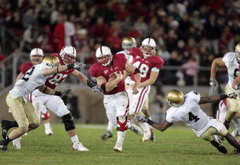 PALO ALTO, CA - NOVEMBER 28:  Toby Gerhart #7 of the Stanford Cardinal runs with the ball during their game against the Notre Dame Fighting Irish at Stanford Stadium on November 28, 2009 in Palo Alto, California.  (Photo by Ezra Shaw/Getty Images)