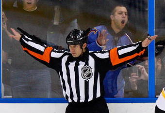 ATLANTA - NOVEMBER 19:  Referee Brian Pochmara #43 during the game between the Boston Bruins and the Atlanta Thrashers at Philips Arena on November 19, 2009 in Atlanta, Georgia.  (Photo by Kevin C. Cox/Getty Images)