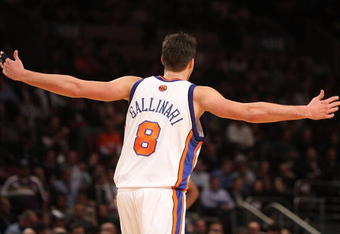 NEW YORK - DECEMBER 01:  Danilo Gallinari #8 of the New York Knicks reacts to a basket against the Phoenix Suns at Madison Square Garden on December 1, 2009 in New York, New York. NOTE TO USER: User expressly acknowledges and agrees that, by downloading and/or using this Photograph, user is consenting to the terms and conditions of the Getty Images License Agreement.  (Photo by Nick Laham/Getty Images)