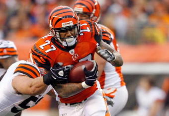 CINCINNATI - NOVEMBER 29:  Larry Johnson #27 of the Cincinnati Bengals runs with the ball  during the NFL game against the Cleveland Browns at Paul Brown Stadium on November 29, 2009 in Cincinnati, Ohio.  (Photo by Andy Lyons/Getty Images)