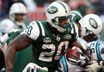 EAST RUTHERFORD, NJ - NOVEMBER 29:  Thomas Jones #20 of the New York Jets runs the ball against the Carolina Panthers on November 29, 2009 at Giants Stadium in East Rutherford, New Jersey. The Jets defeated the Panthers 17-6.  (Photo by Jim McIsaac/Getty Images)