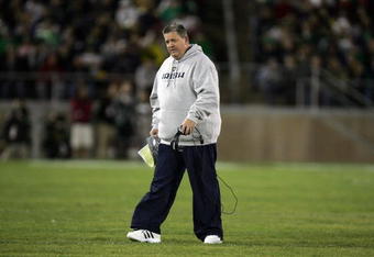 PALO ALTO, CA - NOVEMBER 28:  Notre Dame head coach Charlie Weis walks back to the sideline after speaking to his team during their game against the Stanford Cardinal at Stanford Stadium on November 28, 2009 in Palo Alto, California.  (Photo by Ezra Shaw/Getty Images)