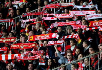 BUDAPEST, HUNGARY - NOVEMBER 24:  Liverpool fans support their team during the UEFA Champions League group E match between Debrecen and Liverpool at the Ferenc Puskas Stadium on November 24, 2009 in Budapest, Hungary.  (Photo by Richard Heathcote/Getty Images)