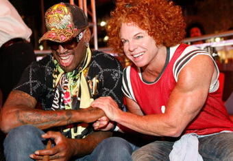 LAS VEGAS - MAY 16:  Former NBA player Dennis Rodman and Comedian Carrot Top celebrate at Hawaiian Tropic Zone's 'Torrid' Nightclub inside the Planet Hollywood Resort & Casino on May 16, 2008 in Las Vegas.  (Photo by Jacob Andrzejczak/Getty Images for Hawaiian Tropic Zone)