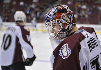 VANCOUVER, CANADA - NOVEMBER 1: Peter Budaj #31 of the Colorado Avalanche looks over toward the Vancouver Canucks team bench during warmup at General Motors Place on November 1, 2009 in Vancouver, Canada.   (Photo by Nick Didlick/Getty Images)