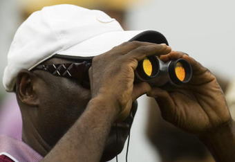CHARLESTON, SC - OCTOBER 24: A fan uses a pair of binoculars to keep an eye on action on the first hole during the third round of the Nationwide Tour Championship at Daniel Island on October 24, 2009 in Charleston, South Carolina. (Photo by Chris Keane/Getty Images)