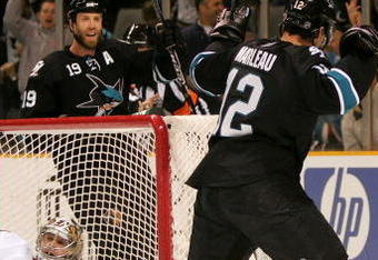 SAN JOSE, CA - DECEMBER 01:  Patrick Marleau #12 and Joe Thornton #19 of the San Jose Sharks celebrate after Marleau scored a goal on goalie Brian Elliott #30 of the Ottawa Senators at HP Pavilion on December 1, 2009 in San Jose, California.  (Photo by Ezra Shaw/Getty Images)