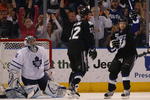 TAMPA, FL - FEBRUARY 12: Vesa Toskala #35 of the Toronto Maple Leafs is the victim of four first period goals in his game against the Tampa Bay Lightning on February 12, 2009 at the St. Pete Times Forum in Tampa, Florida. Ryan Malone #12 (L) and Cory Murphy #21 (R) celebrate this score. (Photo by Bruce Bennett/Getty Images)