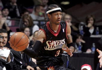 EAST RUTHERFORD, NJ - DECEMBER 10: Allen Iverson #3 of the Philadelphia 76ers looks to make a pass against the New Jersey Nets during their game at Continental Airlines Arena on December 10, 2005 in East Rutherford, New Jersey.The Sixers defeated the Nets 107-95. NOTE TO USER: User expressly acknowledges and agrees that, by downloading and or using this photograph, User is consenting to the terms and conditions of the Getty Images License Agreement. (Photo by Jim McIsaac/Getty Images)             