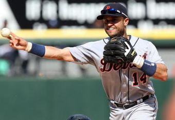 CHICAGO - JUNE 08:  Placido Polanco #14 of the Detroit Tigers turns a game-ending double play, forcing Alexei Ramirez #10 of the Chicago White Sox on June 8, 2009 at U.S. Cellular Field in Chicago, Illinois. The Tigers defeated the White Sox 5-4. (Photo by Jonathan Daniel/Getty Images)