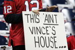 HOUSTON - NOVEMBER 23:  A fan of Houston Texans holds up a sign which reads 'This 'Aint Vince's House' in reference to quarterback Vince Young #10 of the Tennessee Titans at Reliant Stadium on November 23, 2009 in Houston, Texas.  (Photo by Stephen Dunn/Getty Images)