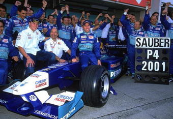 14 Oct 2001:  Sauber drivers Nick Heidfeld (front left) and Kimi Raikkonen (front right) celebrate 4th place in the Constructors Championship with Boss Peter Sauber (front centre) after the Formula One Japanese Grand Prix held at Suzuka in Suzuka, Japan.\ Mandatory Credit: Mark Thompson /Allsport