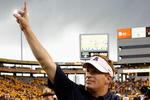 TEMPE, AZ - NOVEMBER 28:  Head coach Mike Stoops of the Arizona Wildcats celebrates after defeating the Arizona State Sun Devils in the college football game at Sun Devil Stadium on November 28, 2009 in Tempe, Arizona.  The Wildcats defeated the Sun Devils 20-17.  (Photo by Christian Petersen/Getty Images)