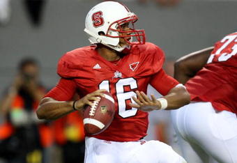 RALEIGH, NC - SEPTEMBER 3:  Quarterback Russell Wilson #16 of the North Carolina State Wolfpack drops back to pass against the South Carolina Gamecocks during the game at Carter-Finley Stadium on September 3, 2009 in Raleigh, North Carolina. (Photo by Streeter Lecka/Getty Images)