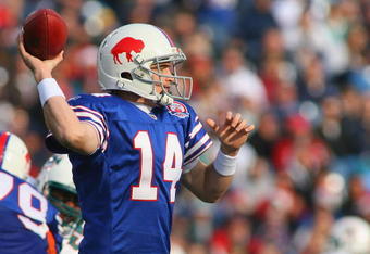 ORCHARD PARK, NY - NOVEMBER 29:  Ryan Fitzpatrick #14 of the Buffalo Bills throws against the  Miami Dolphins at Ralph Wilson Stadium on November 29, 2009 in Orchard Park, New York. Buffalo won 31-14.  (Photo by Rick Stewart/Getty Images)
