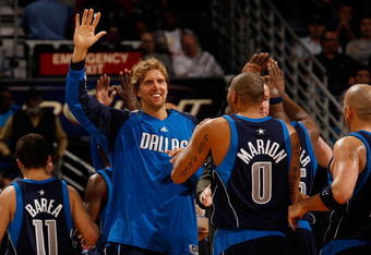NEW ORLEANS - NOVEMBER 04:  Dirk Nowitzki #41  and Shawn Marion #0 of the Dallas Mavericks celebrates during the game against the New Orleans Hornets at New Orleans Arena on November 4, 2009 in New Orleans, Louisiana.  NOTE TO USER: User expressly acknowledges and agrees that, by downloading and or using this photograph, User is consenting to the terms and conditions of the Getty Images License Agreement.  (Photo by Chris Graythen/Getty Images)