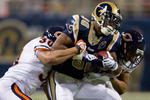 ST. LOUIS, MO - NOVEMBER 23:  Antonio Pittman #30 of the St. Louis Rams is stopped against the Chicago Bears at the Edward Jones Dome on November 23, 2008 in St. Louis, Missouri.  The Bears beat the Rams 27-3.  (Photo by Dilip Vishwanat/Getty Images)