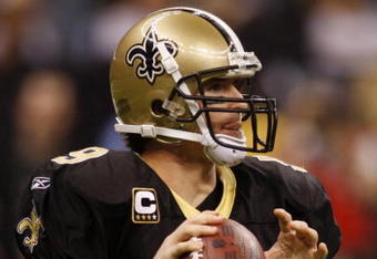 NEW ORLEANS - NOVEMBER 30: Quarterback Drew Brees #9 of the New Orleans Saints drops back to pass against the New England Patriots at Louisana Superdome on November 30, 2009 in New Orleans, Louisiana. (Photo by Chris Graythen/Getty Images)