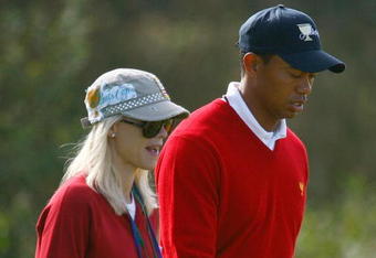 SAN FRANCISCO - OCTOBER 08:  Tiger Woods of the USA Team walks with his wife Elin during the Day One Foursome Matches of The Presidents Cup at Harding Park Golf Course on October 8, 2009 in San Francisco, California.  (Photo by Scott Halleran/Getty Images)