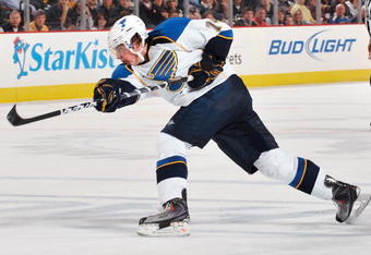 PITTSBURGH - OCTOBER 20:  Center TJ Oshie #74 of the St. Louis Blues shoots the puck against the Pittsburgh Penguins on October 20, 2009 at Mellon Arena in Pittsburgh, Pennsylvania.  (Photo by Jamie Sabau/Getty Images)