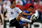 SANDY, UT - SEPTEMBER 05:  Landon Donavan #10 of the United States battles Ramon Flores #5 of El Salvador during the FIFA 2010 World Cup Qualifier match between the United States and El Salvador at Rio Tinto Stadium on September 5, 2009 in Sandy, Utah.  (Photo by Jonathan Ferrey/Getty Images)