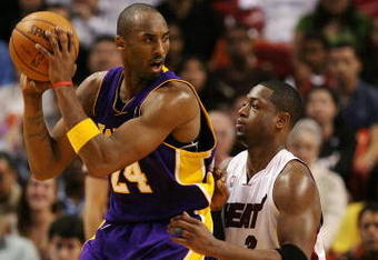 MIAMI - DECEMBER 19:  Dwyane Wade #3 of the Miami Heat guards Kobe Bryant #24 of the Los Angeles Lakers at American Airlines Arena on December 19, 2008 in Miami, Florida. The Heat defeated the Lakers 89-87. NOTE TO USER: User expressly acknowledges and agrees that, by downloading and/or using this Photograph, user is consenting to the terms and conditions of the Getty Images License Agreement.  (Photo by Doug Benc/Getty Images)
