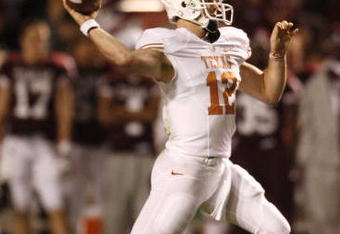 COLLEGE STATION, TX - NOVEMBER 26: Quarterback Colt McCoy #12 of the Texas Longhorns looks to pass the ball downfield against the Texas A&M Aggies in the first half at Kyle Field on November 26, 2009 in College Station, Texas. The Longhorns defeated the Aggies 49-39. (Photo by Aaron M. Sprecher/Getty Images