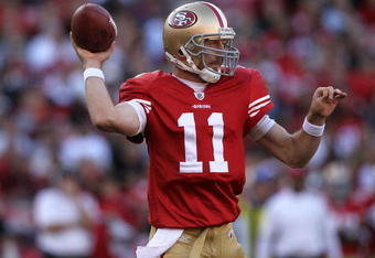 SAN FRANCISCO - NOVEMBER 29:  Alex Smith #11 of the San Francisco 49ers passes against the Jacksonville Jaguars during an NFL game at Candlestick Park on November 29, 2009 in San Francisco, California.  (Photo by Jed Jacobsohn/Getty Images)