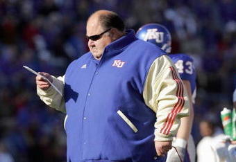 LAWRENCE, KS - NOVEMBER 18:  Mark Mangino  of the Kansas Jayhawks stands on the field during the game against the Kansas State Wildcats on November 18, 2006 at Memorial Stadium in Lawrence, Kansas.  Kansas won 39-20.  (Photo by Brian Bahr/Getty Images)