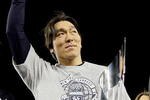 NEW YORK - NOVEMBER 4:  World Series MVP Hideki Matsui #55 of the New York Yankees celebrates with the MVP trophy after their 7-3 win against the Philadelphia Phillies in Game Six of the 2009 MLB World Series at Yankee Stadium on November 4, 2009 in the Bronx borough of New York City.  (Photo by David J. Phillip-Pool/Getty Images)