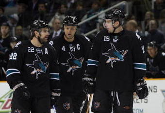 SAN JOSE, CA - DECEMBER 03:  Dan Boyle #22, Rob Blake #4 and Dany Heatley #15 of the San Jose Sharks skate on to the ice after a break in action during their game against the St. Louis Blues at HP Pavilion on December 3, 2009 in San Jose, California.  (Photo by Ezra Shaw/Getty Images)