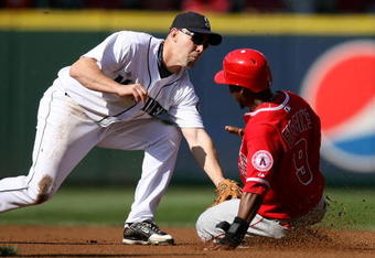 SEATTLE - SEPTEMBER 02:  Chone Figgins #9 of the Los Angeles Angels of Anaheim is tagged out at second base by Jack Wilson #9 of the Seattle Mariners on September 2, 2009 at Safeco Field in Seattle, Washington. (Photo by Otto Greule Jr/Getty Images)