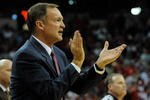 LAS VEGAS - NOVEMBER 28:  Head coach Lon Kruger of the UNLV Rebels applauds his players as they take on the Louisville Cardinals at the Thomas & Mack Center November 28, 2009 in Las Vegas, Nevada. The Rebels defeated the Cardinals 76-71.  (Photo by Ethan Miller/Getty Images)